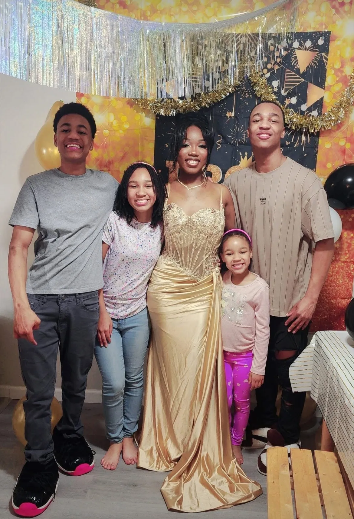 Tabitha with her four siblings on prom night, 2025